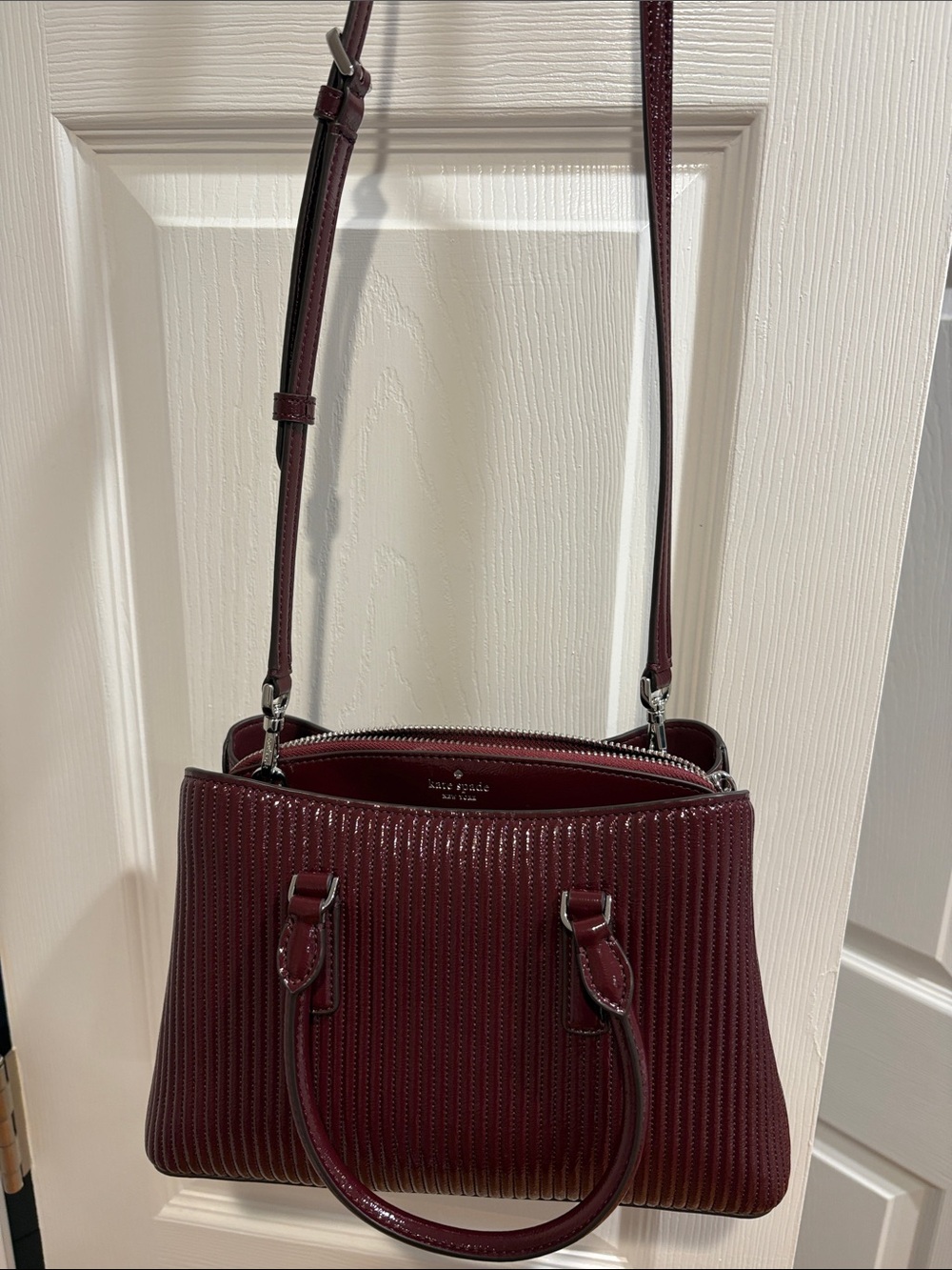 Kate Spade Thompson Street Shiny Crinkle Patent Satchel in Grenache